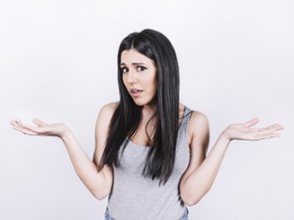 Unsure woman looking at camera